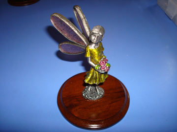 Pewter Fairy Holding Some Flowers